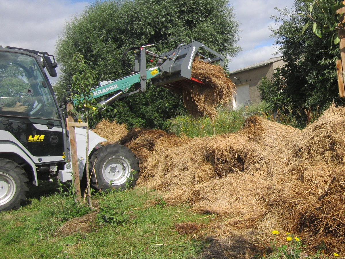 Turning hey and straw into compost garden beds for our self sufficient&nbsp;living